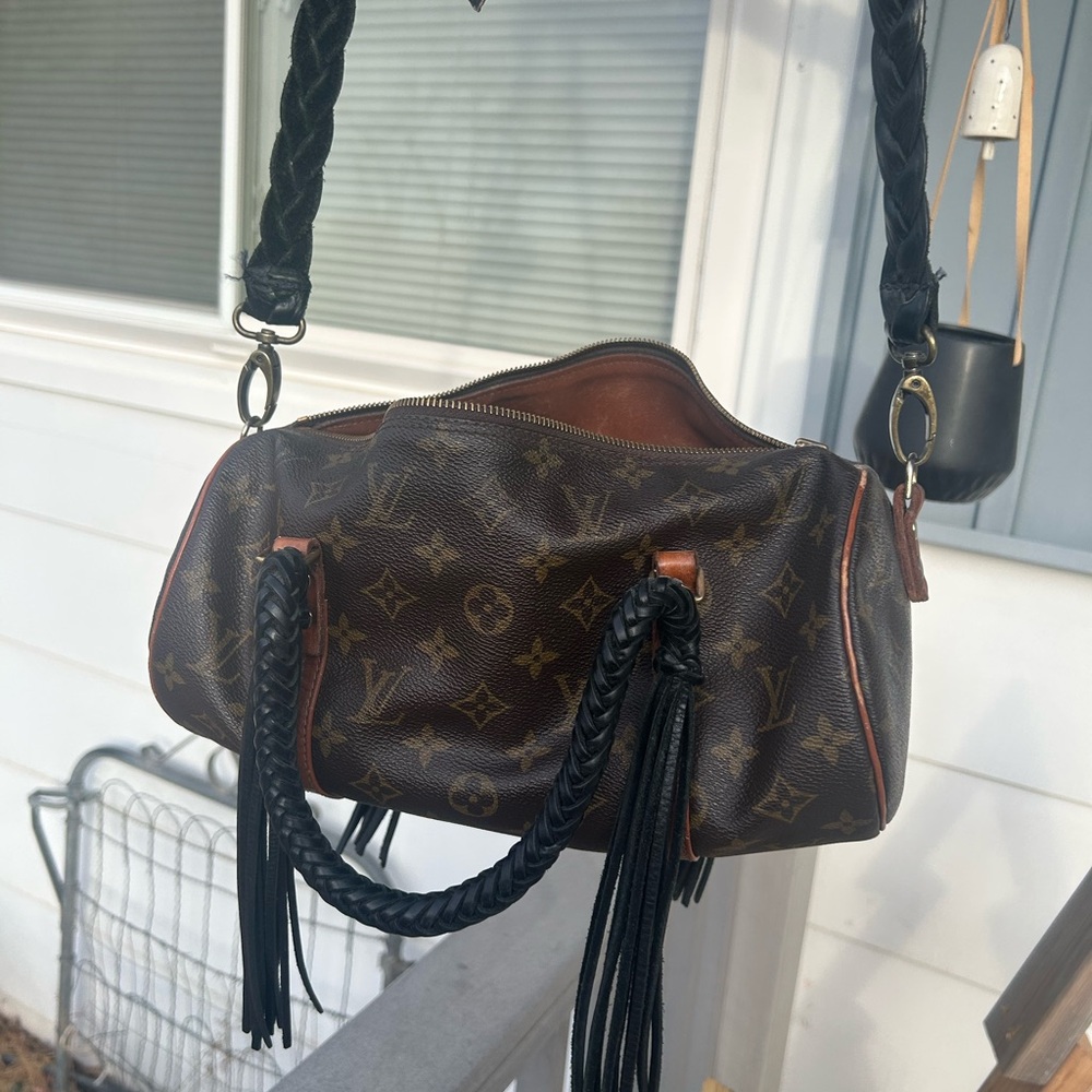 Beautiful remastered Louise Vuitton bag by the company Vintage Boho Bags. 
.